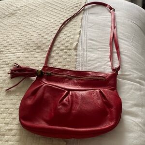 Little red crossbody purse. Adjustable strap, genuine Italian leather.